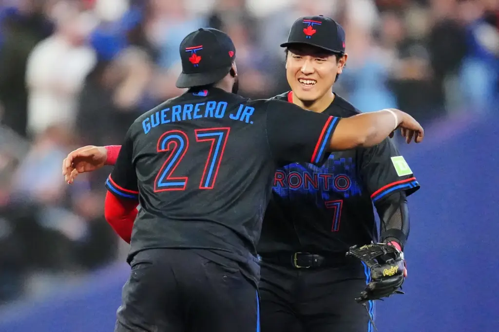 Toronto Blue Jays star Vladimir Guerrero Jr., left, and third...