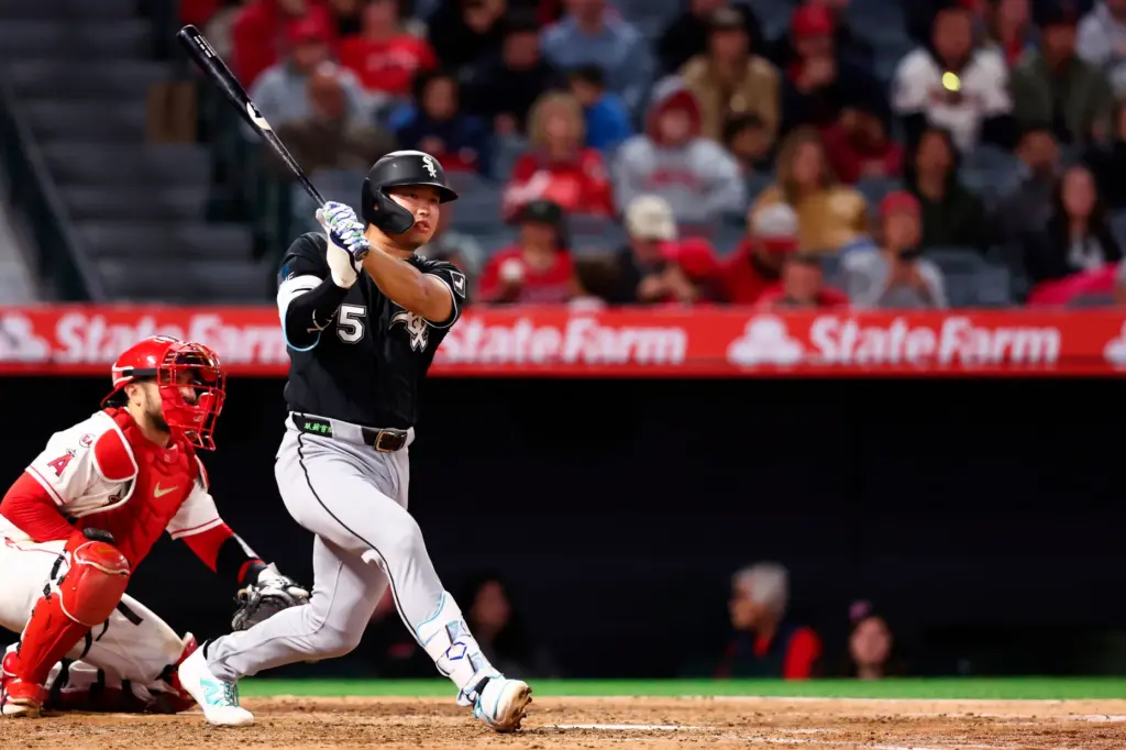 The Chicago White Sox’s Munetaka Murakami follows through on his...
