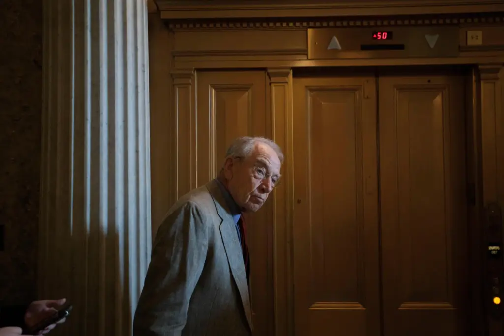 Sen. Chuck Grassley, R-Iowa, walks