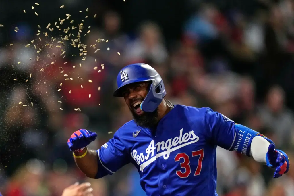 The Dodgers’ Teoscar HernÃ¡ndez has sunflower seeds thrown at him...