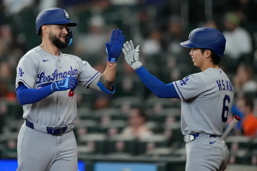 The Dodgers’ Andy Pages, left, celebrates with Hyeseong Kim after...