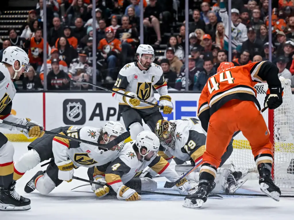 The Ducksâ Ross Johnston (44) is met by a wall...