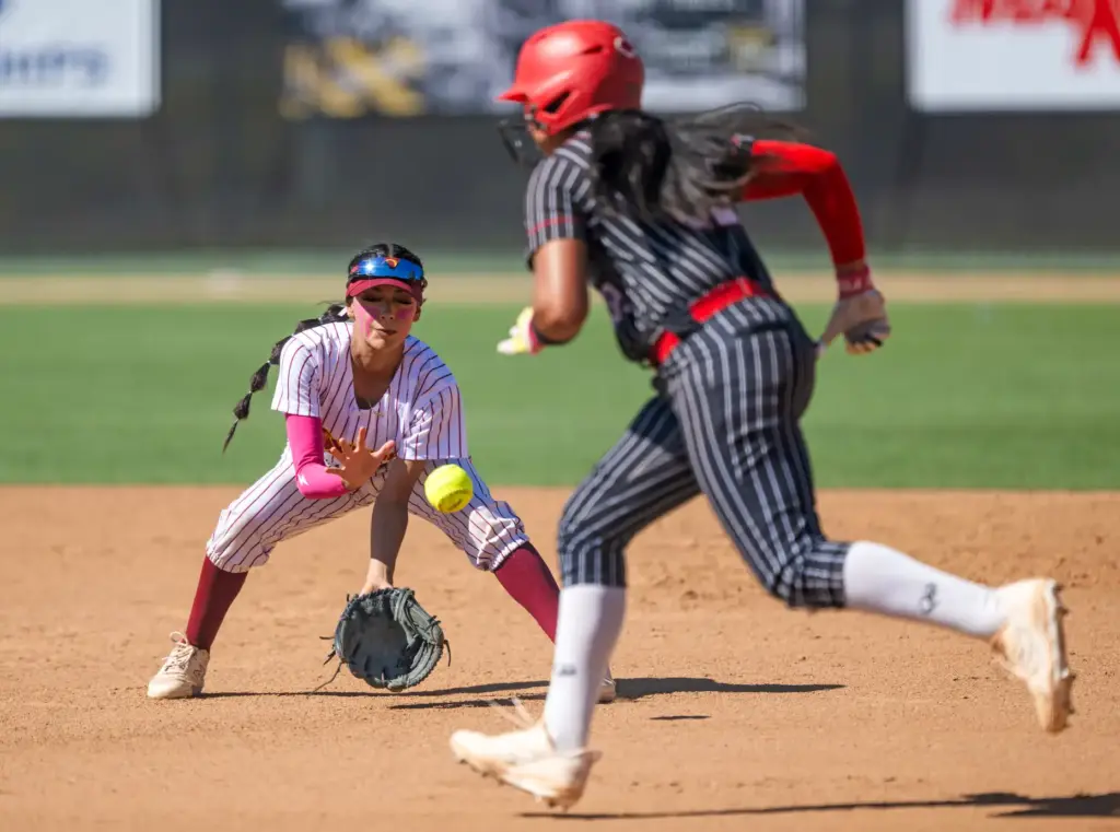 Oxnard second baseman Layla Mukul fields the ball while Mission...