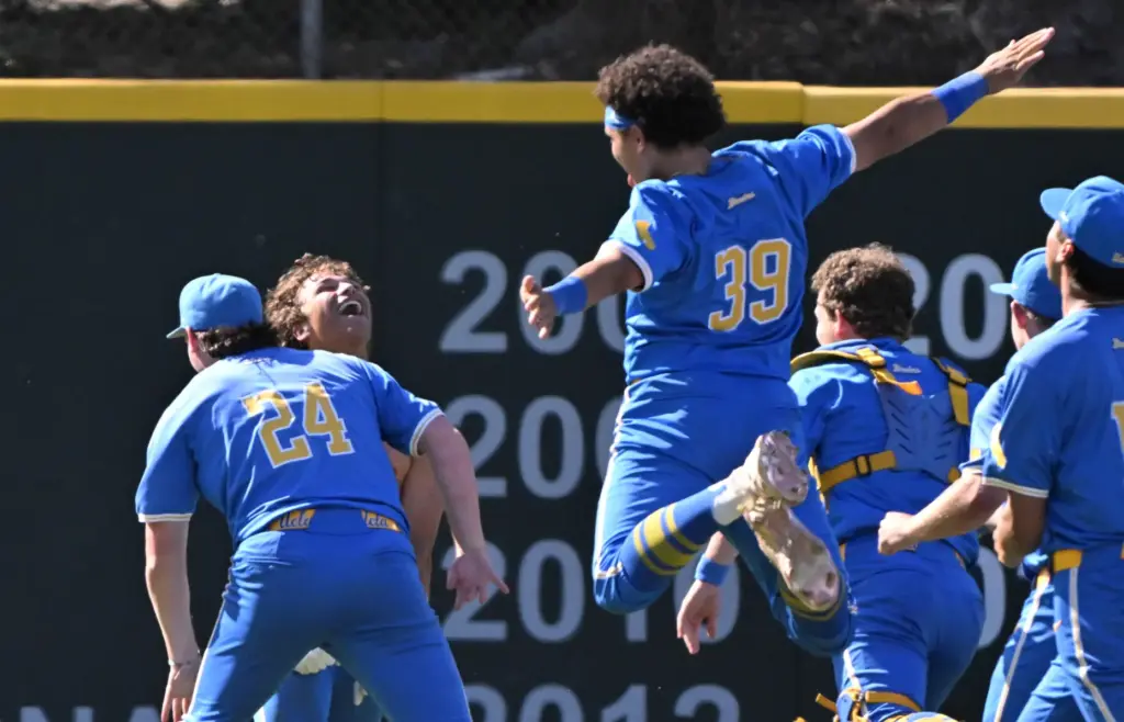 Phoenix Call #4 of the UCLA Bruins is mobbed by...