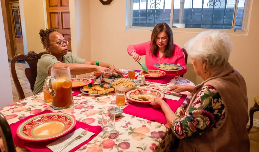 Housemates, from left, Darlene Hastings, Silvia Salazar, and her mother...