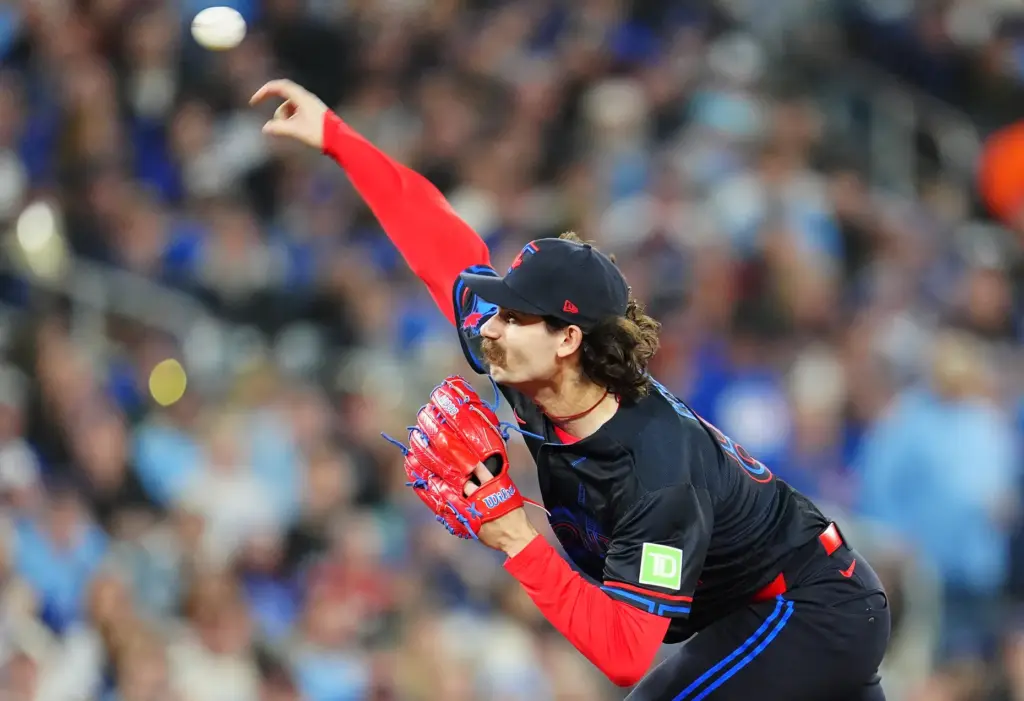 Toronto Blue Jays starting pitcher Dylan Cease throws to the...