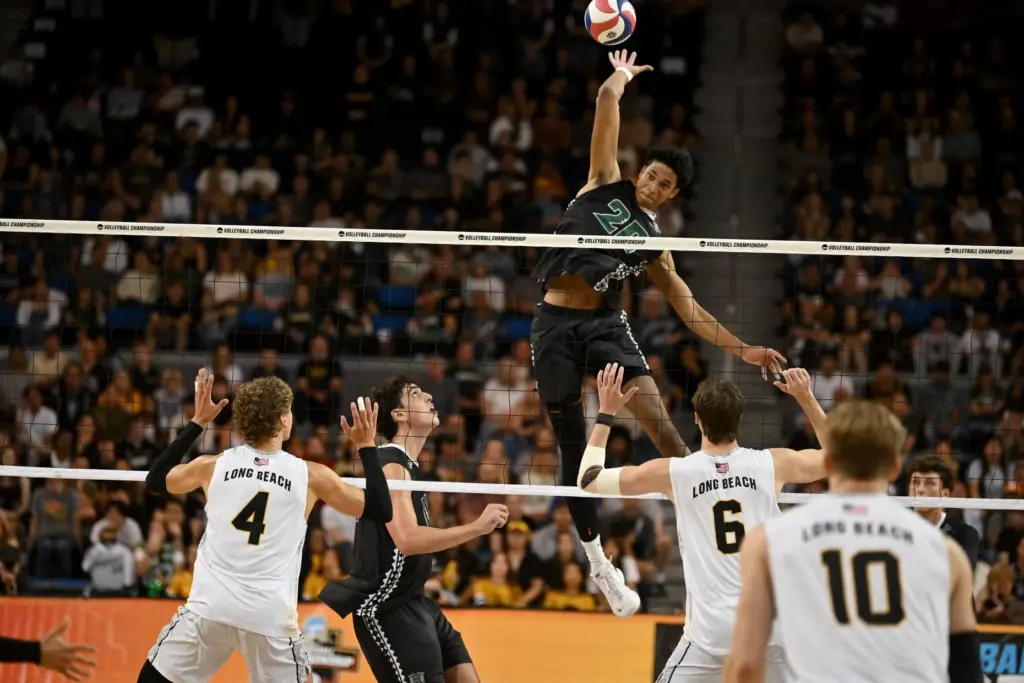 Hawaiiâs Trevell Jordan spikes the ball against Long Beach State...