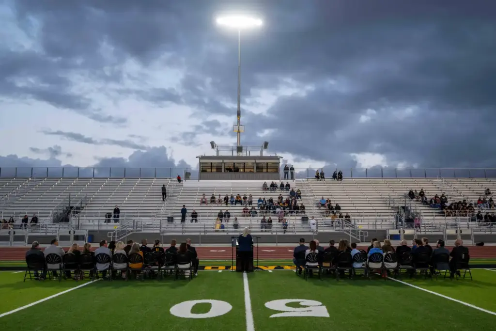 Capistrano Valley High School families look on from the bleachers...