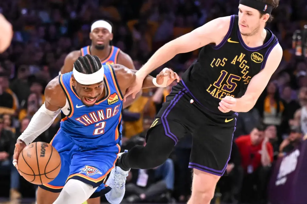 Oklahoma City Thunder star Shai Gilgeous-Alexander drives to the basket...