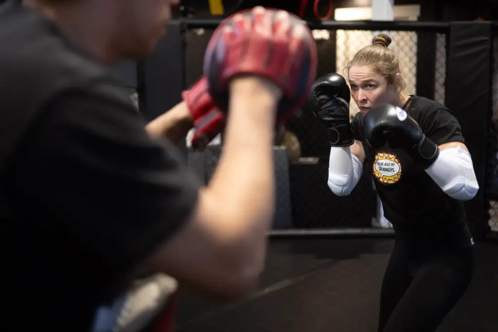 Former UFC champion and Olympic medalist Ronda Rousey prepares for...