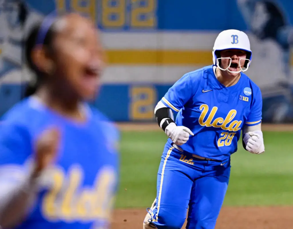 Alexis Ramirez #28 of the UCLA Bruins reacts after hitting...