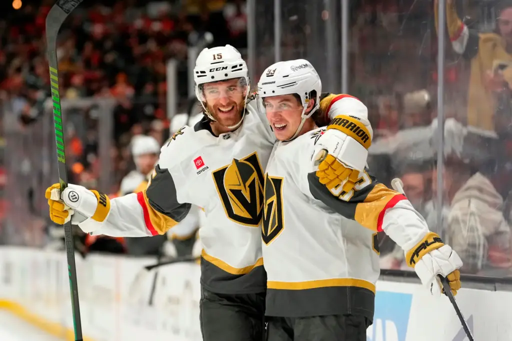 Vegas Golden Knights right wing Mitch Marner, right, celebrates his...
