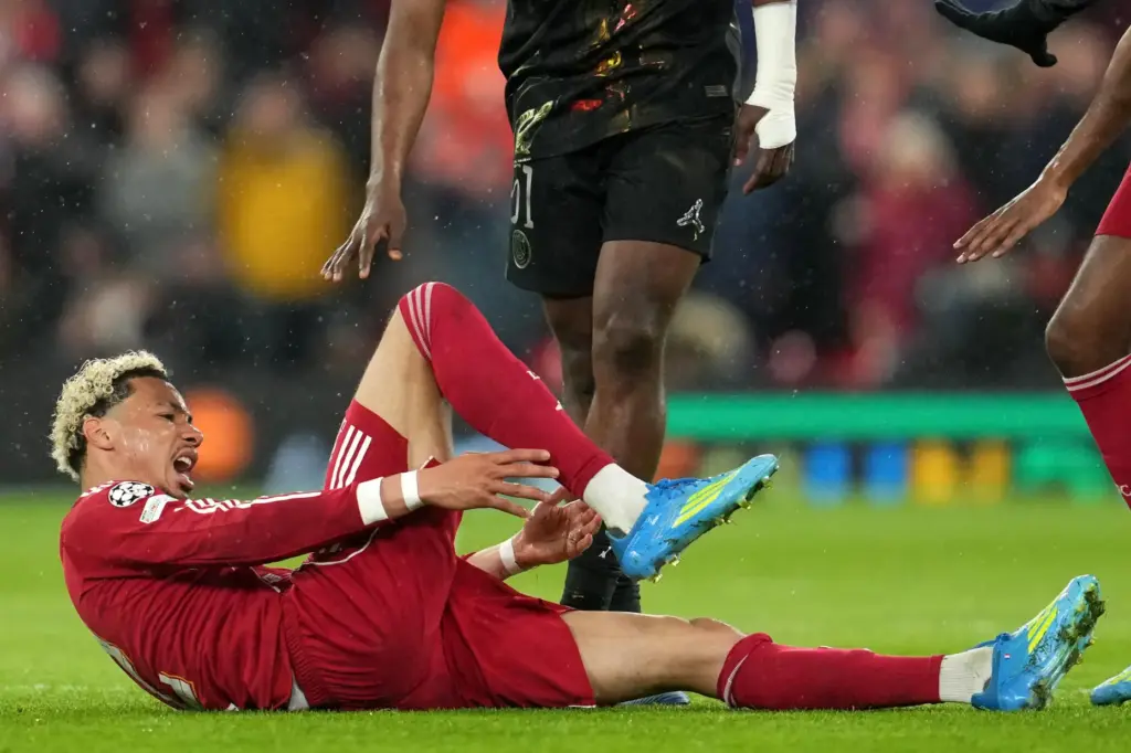 Hugo Ekitike reacts after getting injured