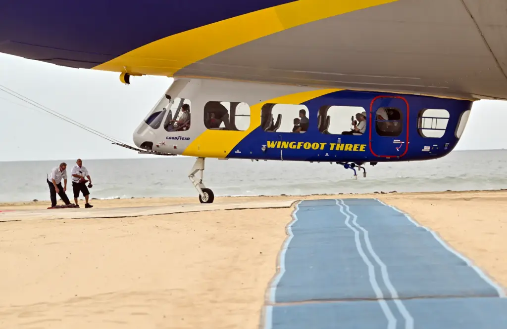 The Goodyear Blimp Wingfoot Three lands on the beach south...
