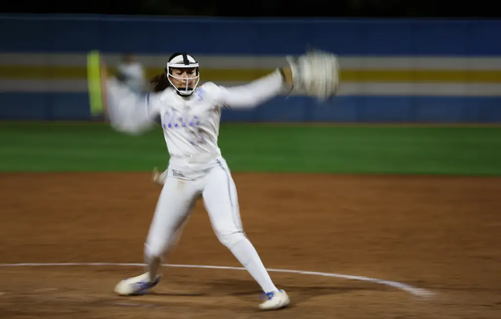 UCLA pitcher Taylor Tinsley throws to the plate during their...