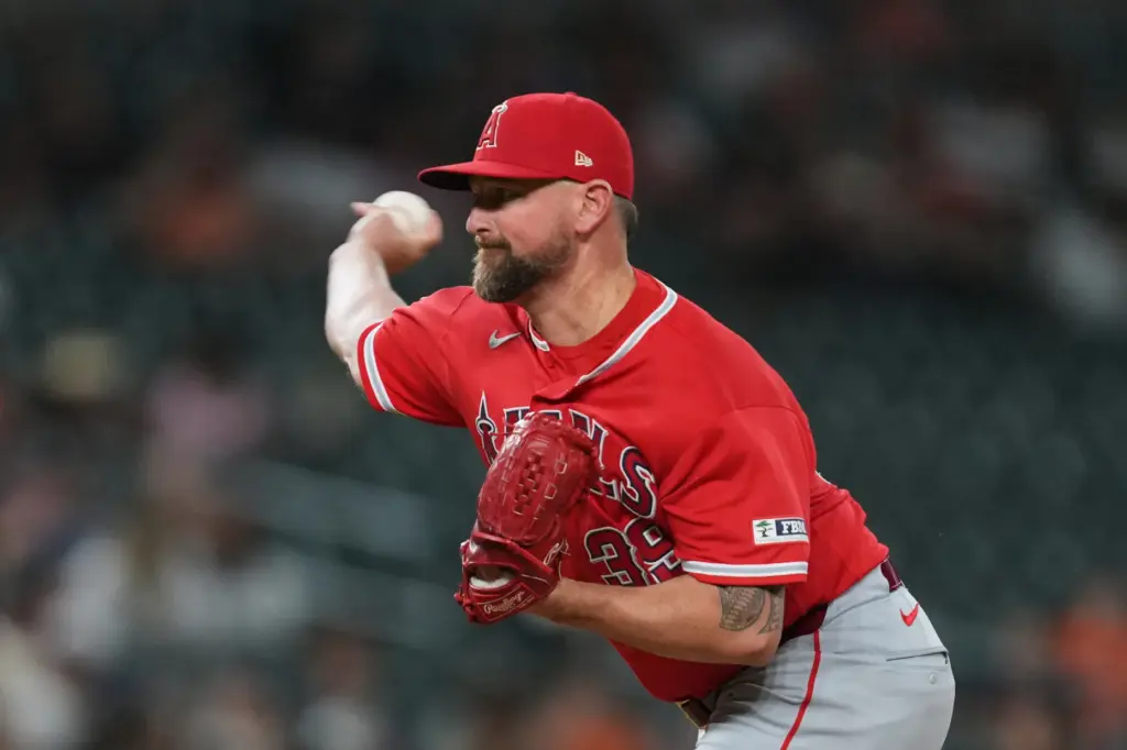Angels relief pitcher Kirby Yates throws to the plate during...