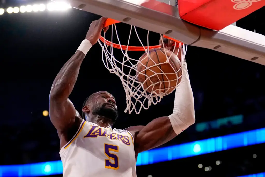Lakers center Deandre Ayton dunks during the first half of...