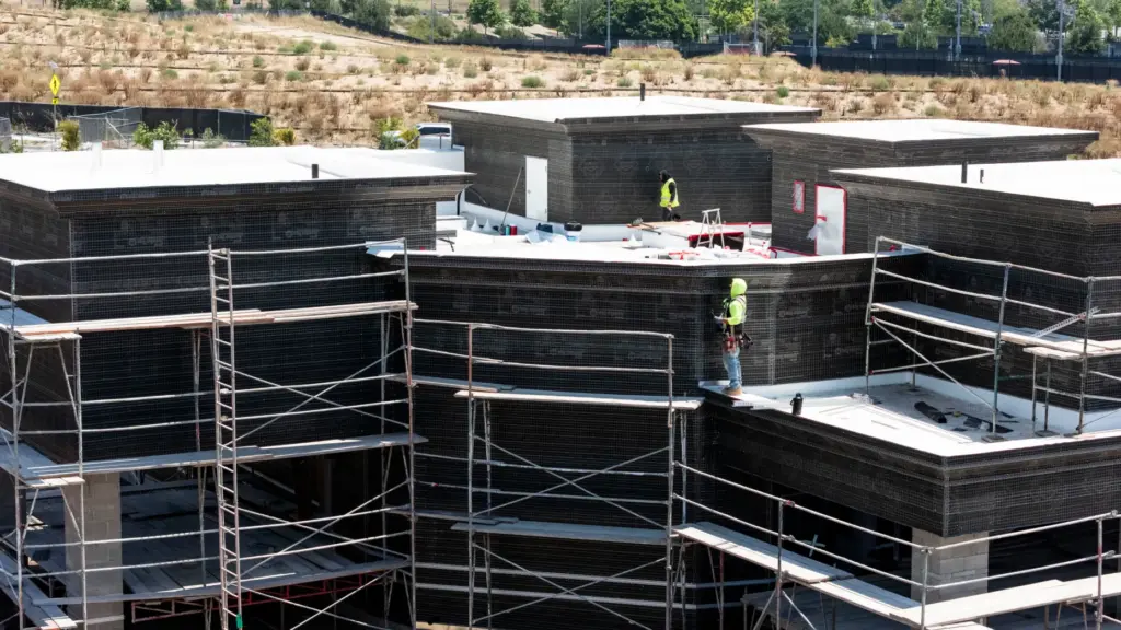 Work continues as In-N-Out Burger builds a drive-thru at the...