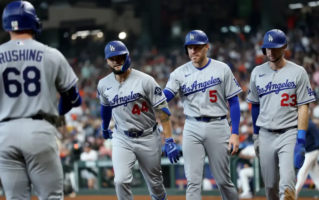 The Dodgers’ Andy Pages (44) is congratulated by teammates Freddie...