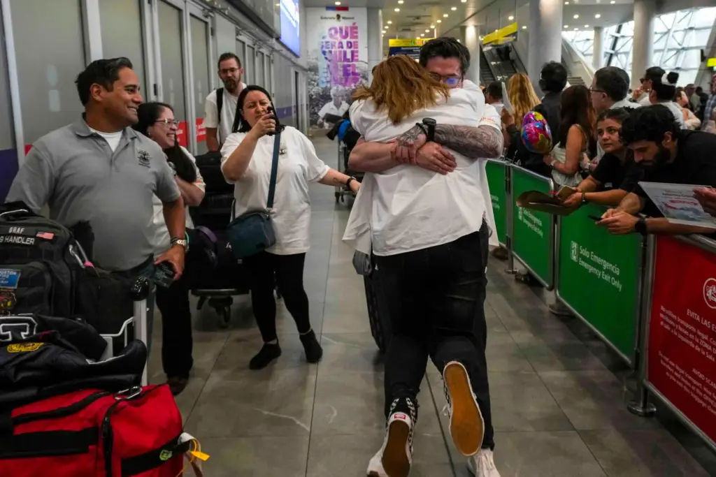 Kyle Adler embraces his birth mother Ana Maria Navarrete