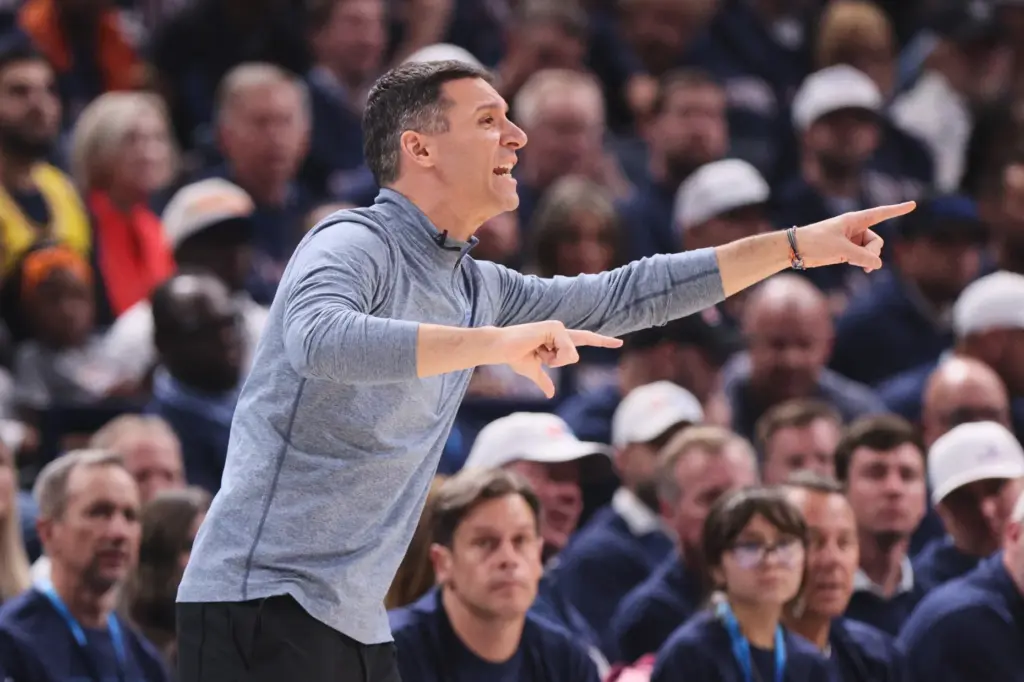 Oklahoma City Thunder head coach Mark Daigneault reacts to play...