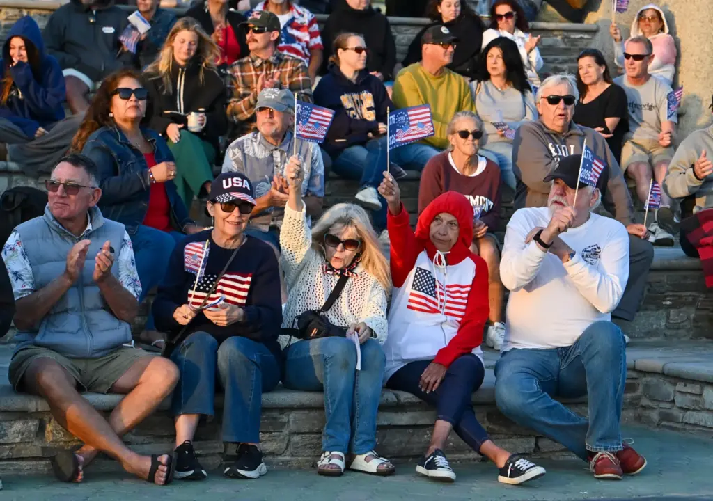 Crowds fill Pier Plaza during a ceremony unveiling the new...