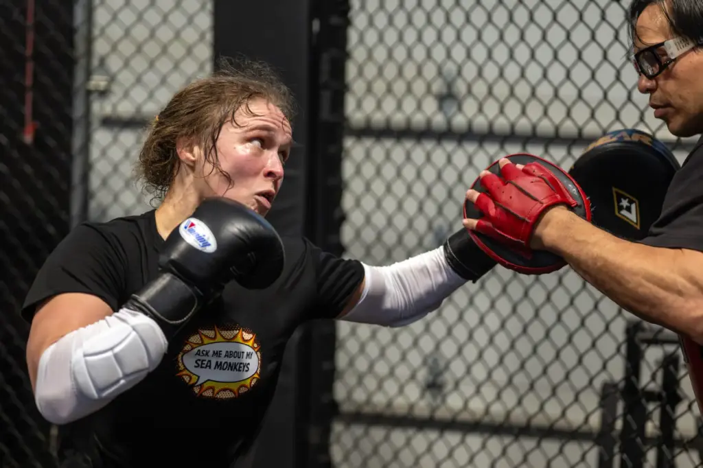 Former UFC champion and Olympic medalist Ronda Rousey prepares for...