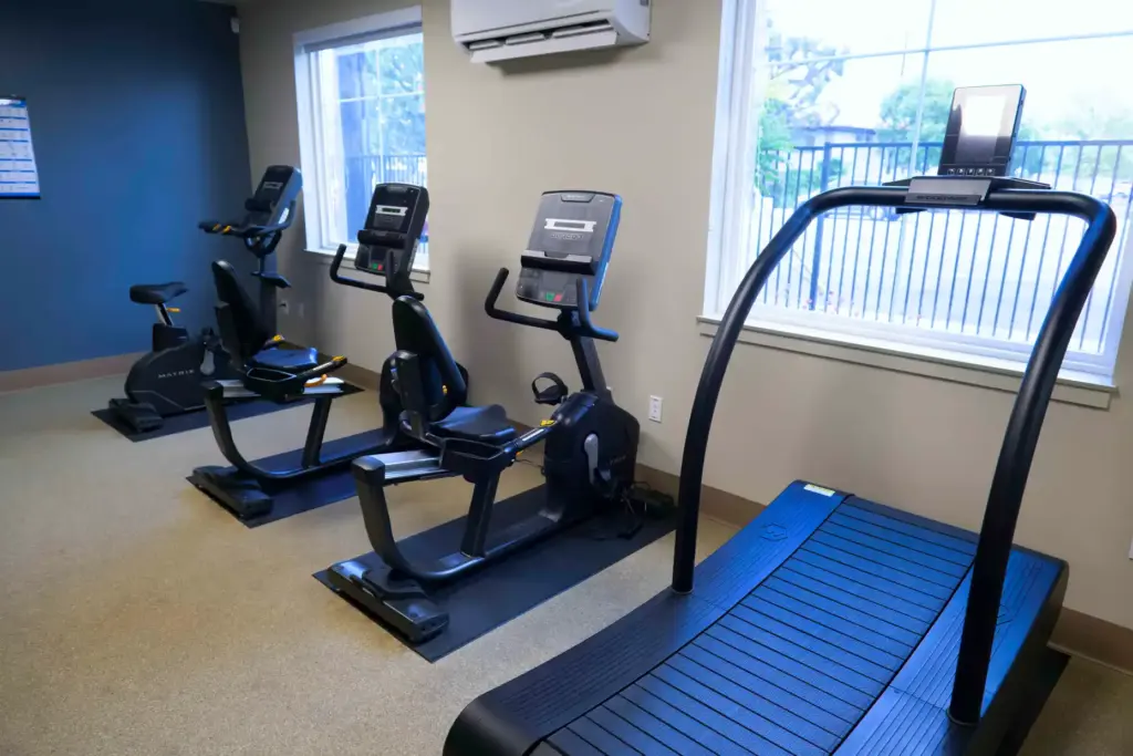 The fitness center at The Orion apartment community for seniors...