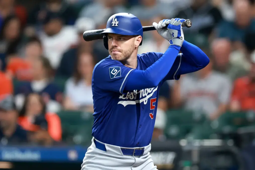 The Dodgers’ Freddie Freeman waits on a pitch while at...