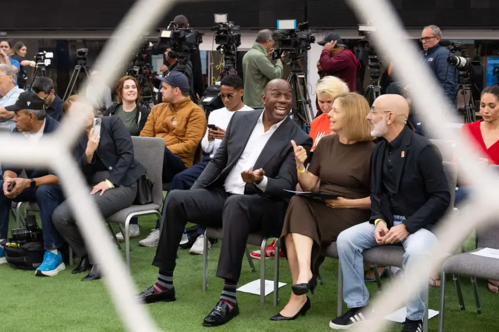 From left, Earvin âMagicâ Johnson, Kathryn Schloessman and Larry Freedman...