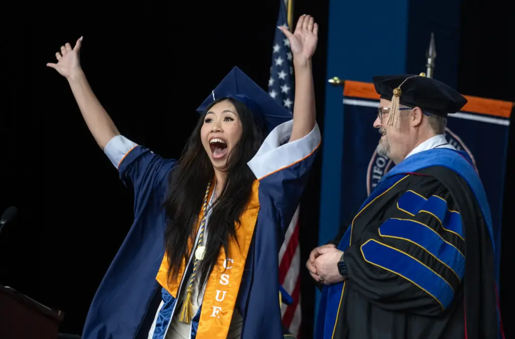 Jocelyn Nguyen acknowledges her friends and family while walking on...
