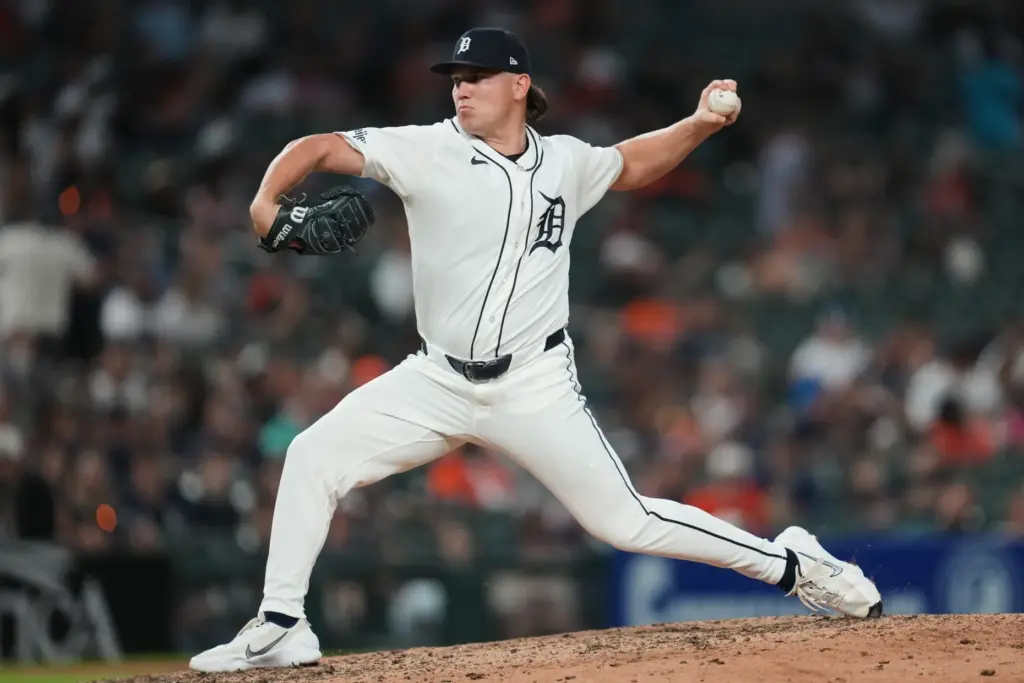 Detroit Tigers pitcher Tyler Holton throws to the plate during...