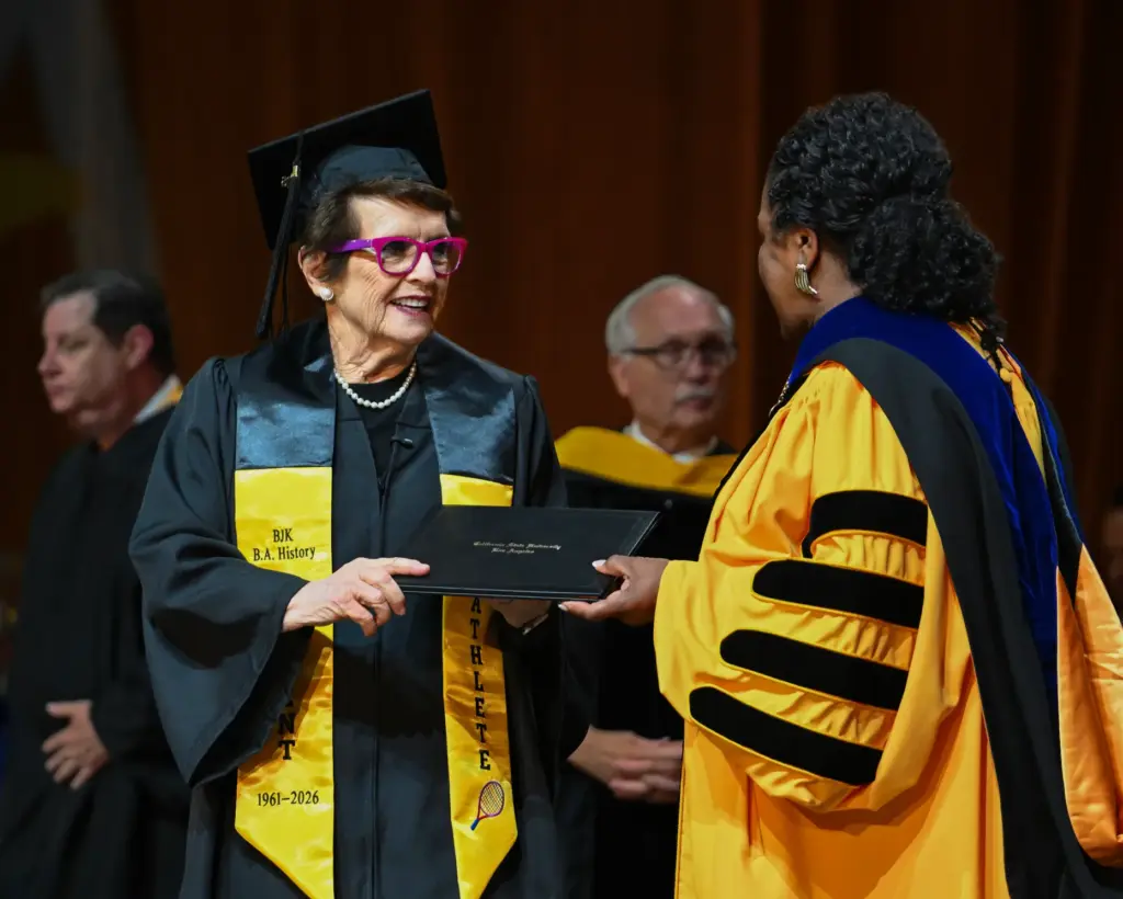 Billie Jean King receives her Bachelor of Arts in History...