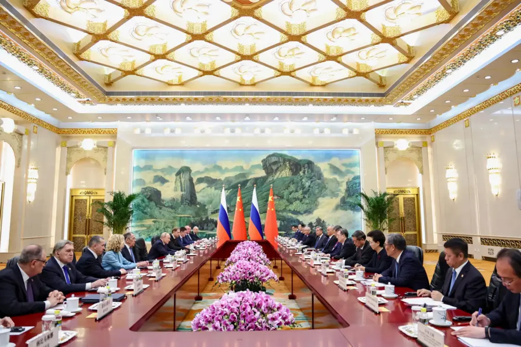 Russian President Vladimir Putin and Chinese President Xi Jinping attend a bilateral meeting.