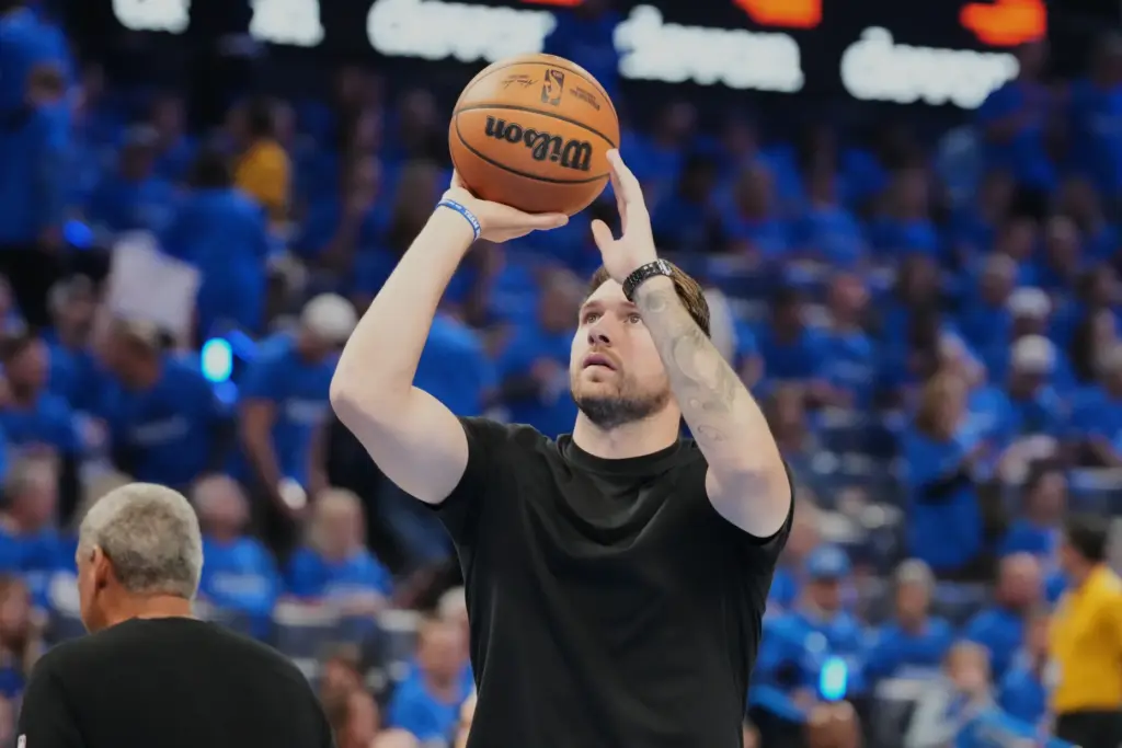 Injured Lakers star Luka Doncic takes a shot during a...
