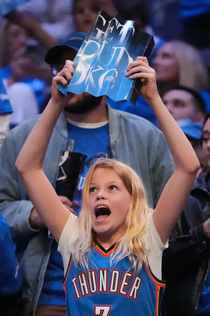 An Oklahoma City Thunder fan celebrates Injured Lakers star Luka...