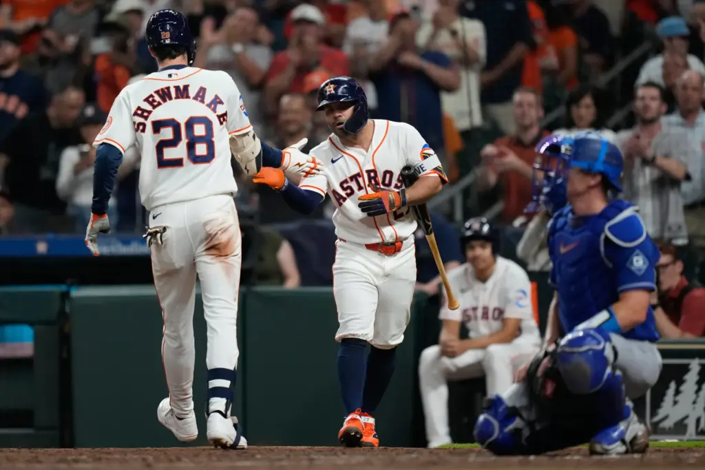 The Houston Astros’ Braden Shewmake (28) celebrates with teammate Jose...