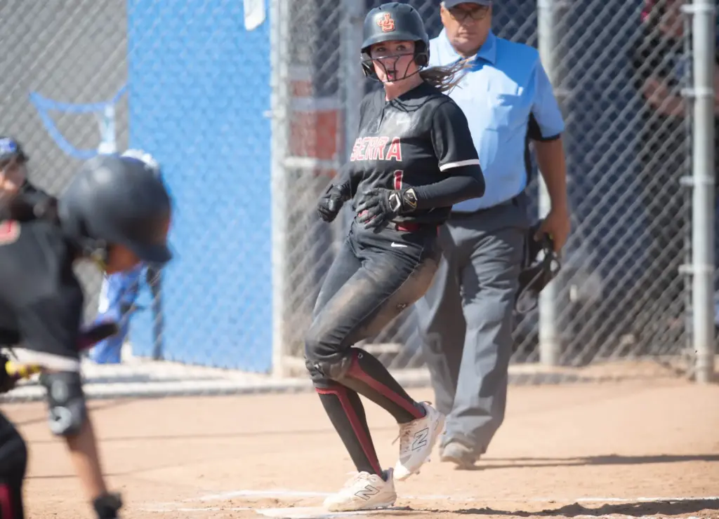 JSerraâs Brooklyn Lamb, (#1), crosses home plate scoring a run...