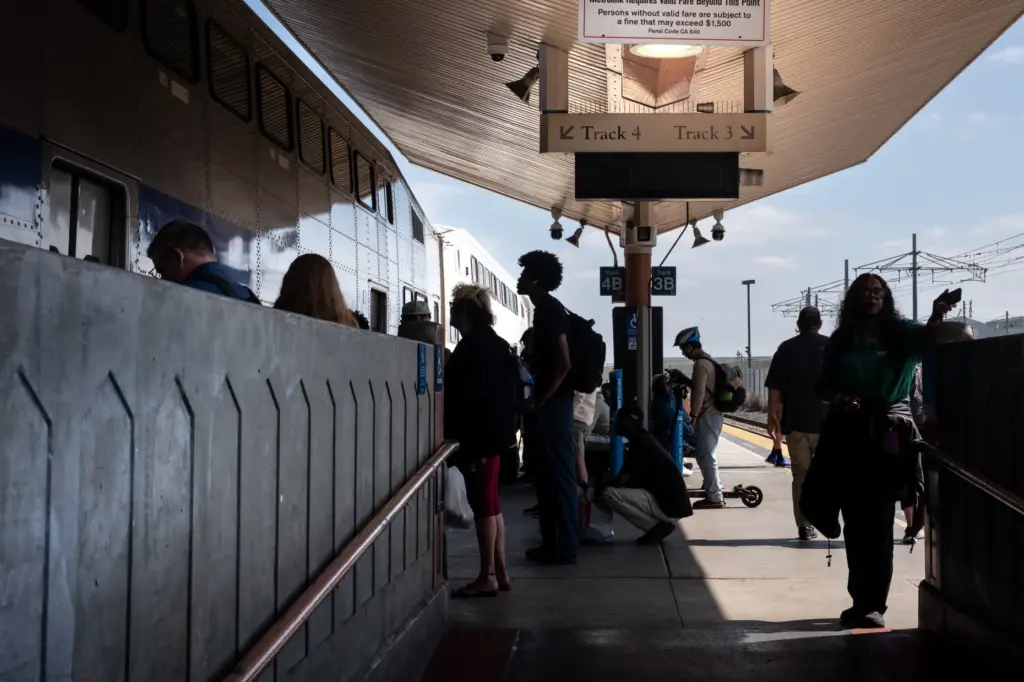 Passengers board the Metrolink train for Lancaster at Union Station...