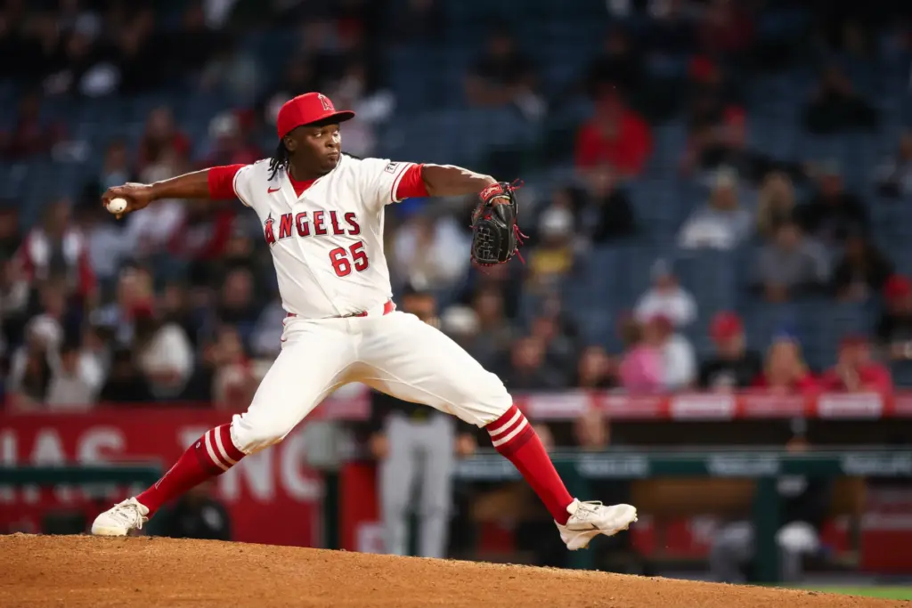 Angels relief pitcher JosÃ© Fermin throws to the plate during...