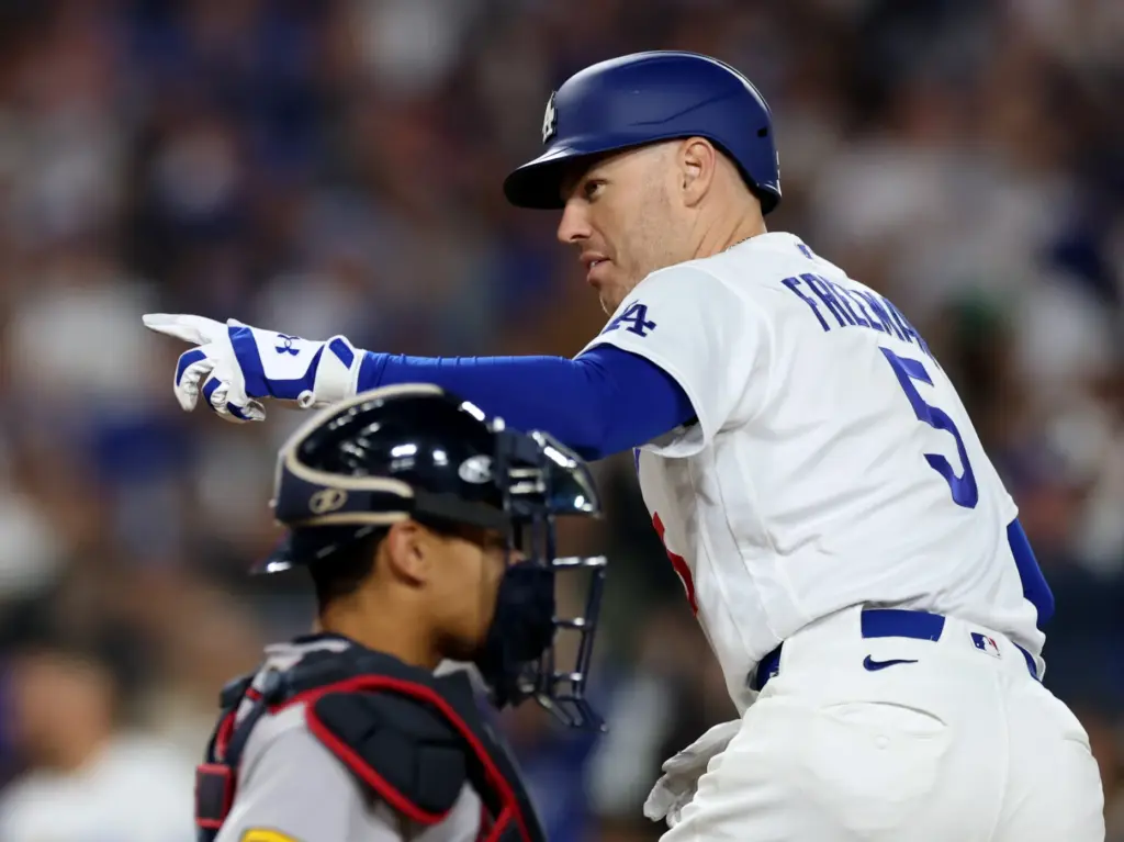 The Dodgers’ Freddie Freeman celebrates after hitting a solo home...