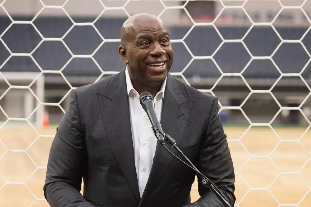 Earvin âMagicâ Johnson speaks during a media event marking 30...