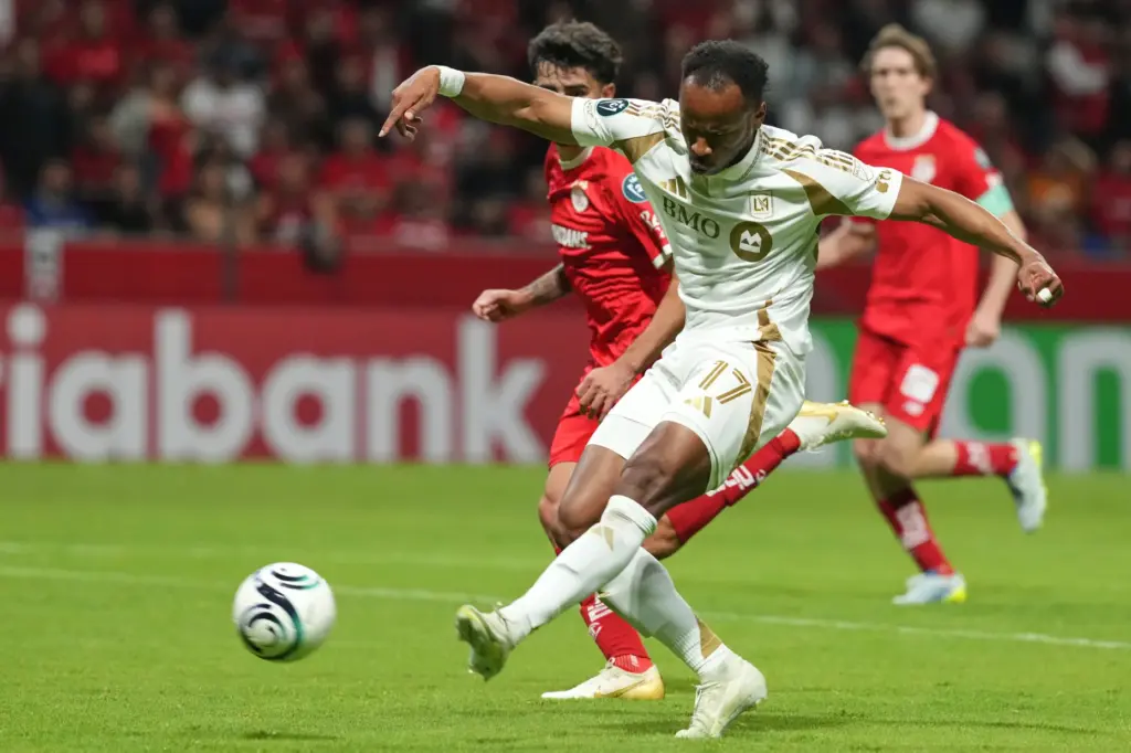 LAFC’s Jeremy Ebobisse, front, attempts a shot on goal during...