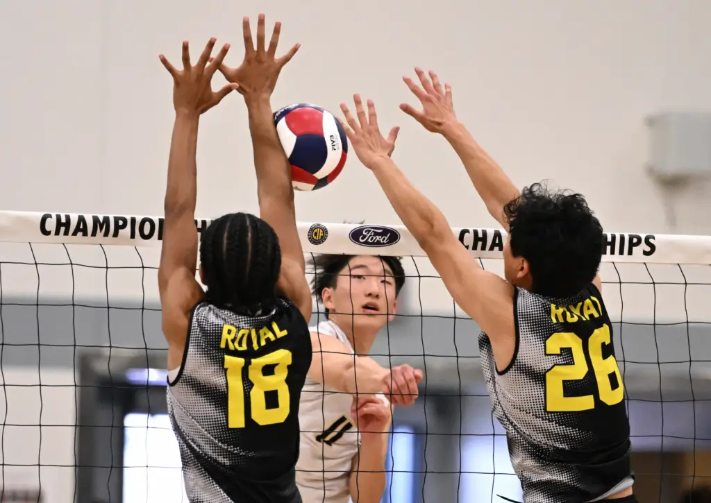 Christian Lee #11 of the Sunny Hills Lancers shoots beteen...