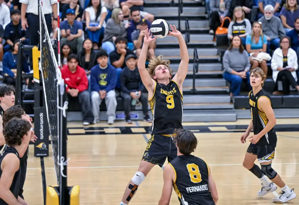 Foothill setter Caden Epperson does a back set during the...