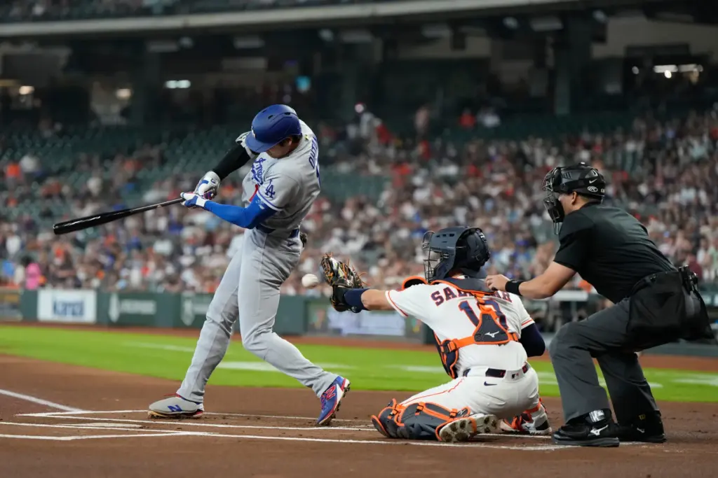 Dodgers star Shohei Ohtani strikes out during the first inning...