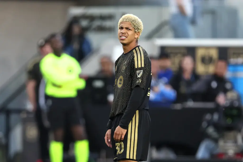 Disappointed LAFC forward David MartÃ­nez reacts after not getting a...