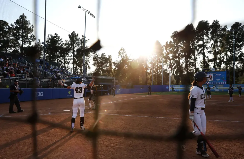 California Baptistâs Kenzie Farrier-Pilon (43) walks up to the batter...