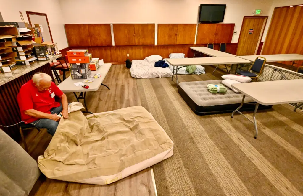 Elk Rick Freidel blows up mattresses at the Elks Lodge...