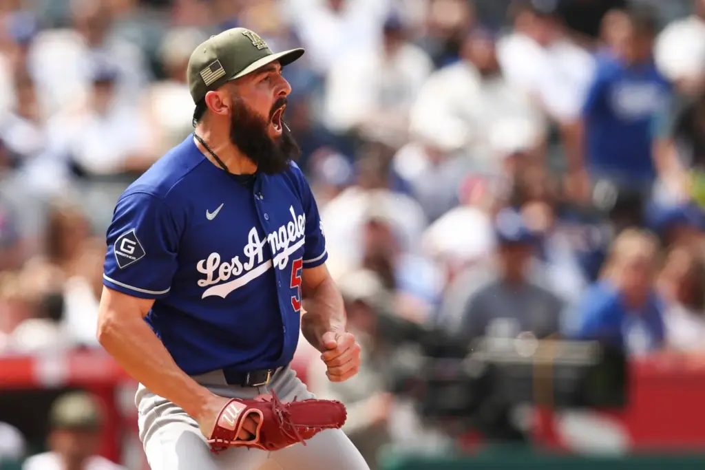 Dodgers pitcher Alex Vesia reacts during the eighth inning of...